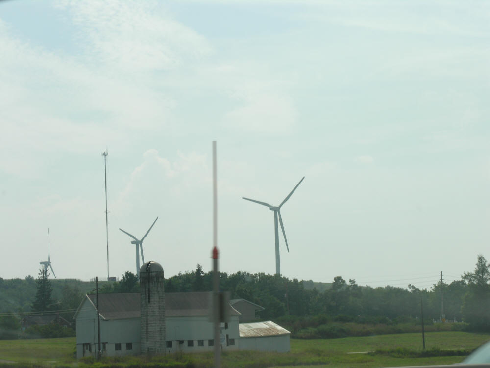 Wind turbines of wind farm in Upstate New York nacelles generating electricity.