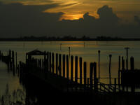 Sunset over the river at the dock in Sebasstian Florida